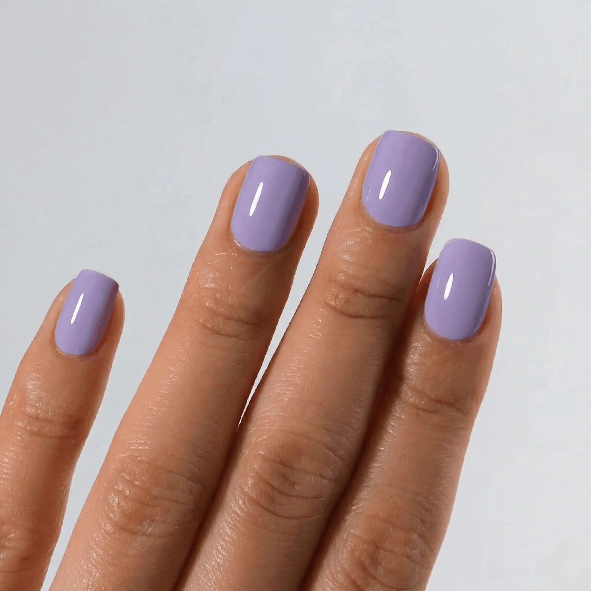 Detailed view of S&L No. 033 Lavender Haze gel polish on square nails with a high-gloss shiny finish.