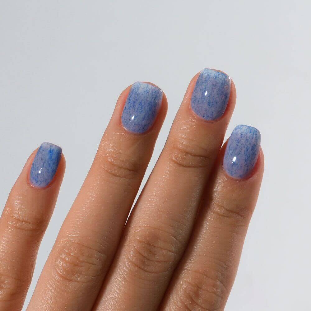 Detailed view of S&L No. 078 Baby Boy Blanket gel polish on square nails with a high-gloss shiny finish.
