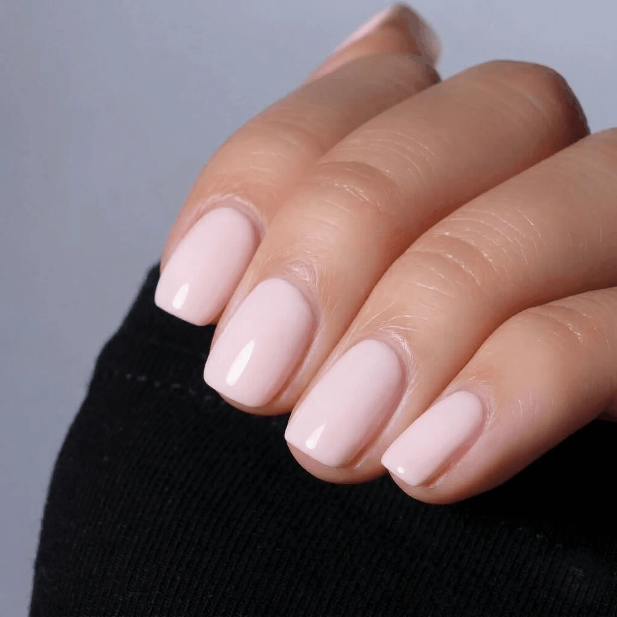 Close-up of a professional manicure featuring S&L Gel Polish No 002 Blush Gown on square-shaped nails