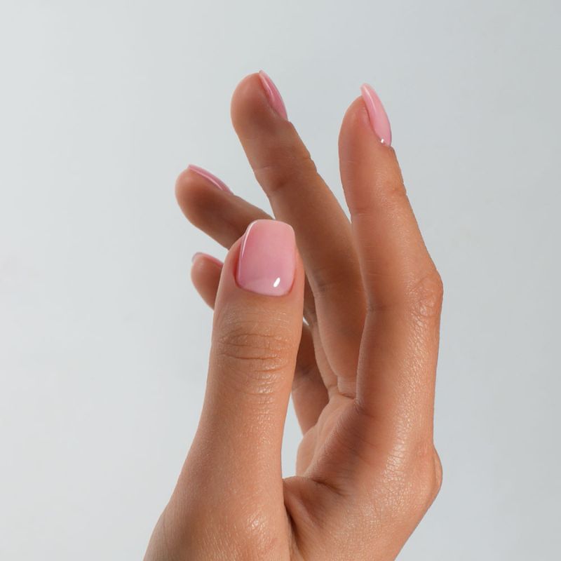 Detailed view of S&L No. 005 Rose Pink gel polish on square nails with a high-gloss shiny finish.