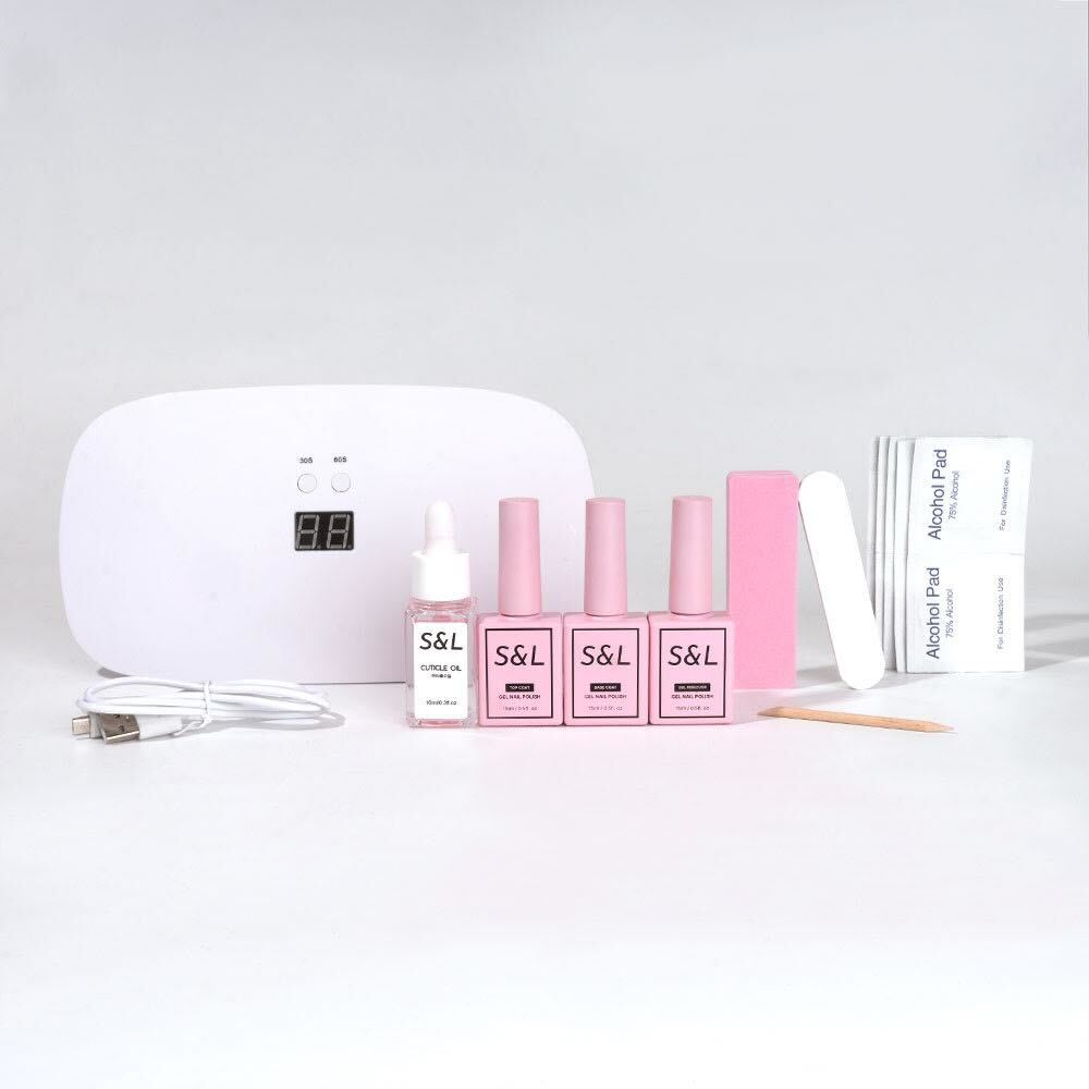 S&L upgraded gel nail starter kit with LED lamp, cuticle oil, gel polish bottles, nail buffer, nail file, wooden cuticle stick and alcohol pads displayed front-facing on white background