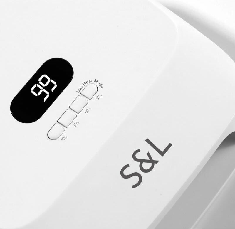 Close-up of S&L UV LED nail lamp showing LED screen with four timer settings (10s, 30s, 60s, 99s) for customizable curing time