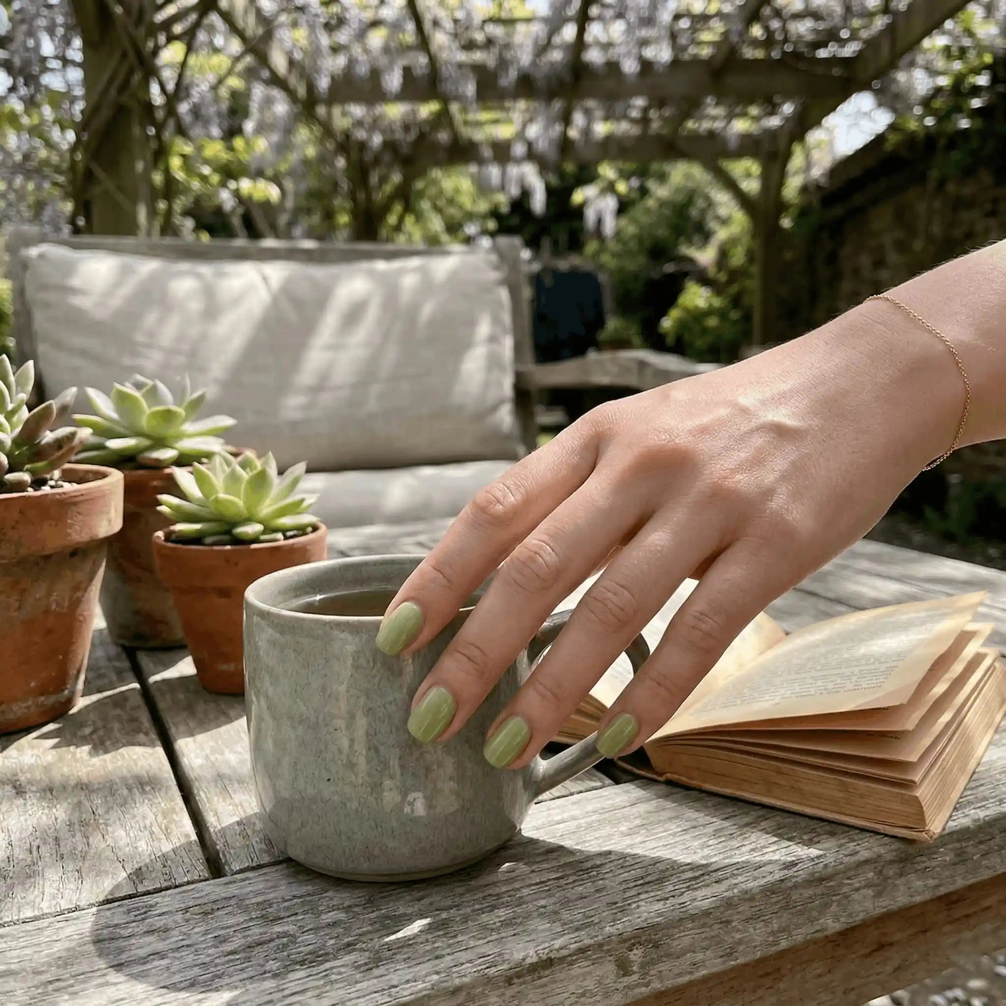 Minimalist lifestyle photography featuring a hand model with square nails in S&L no. 006 Matcha